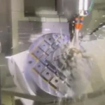High-precision 5-axis CNC machining center milling a custom S136 steel mold for liquid silicone injection.