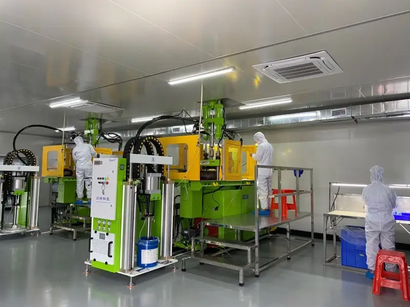 State-of-the-art Class 100,000 cleanroom facility equipped with automated LSR injection molding machines.