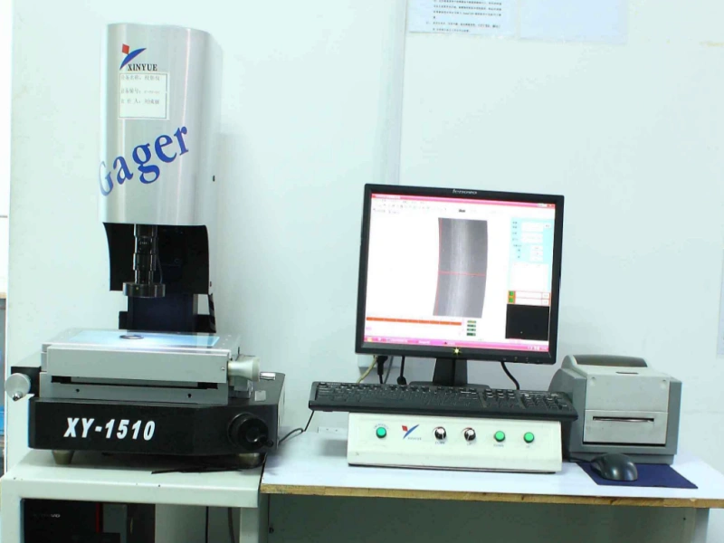 XY-1510 optical measuring system verifying critical dimensions of silicone parts.