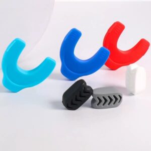 Food-grade silicone jawline training device for wellness applications.