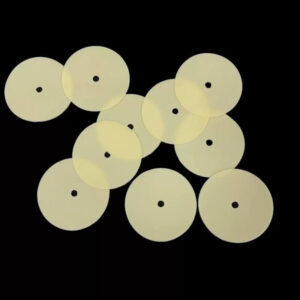 Silicone one-way valve diaphragm for respirator and protective mask systems.