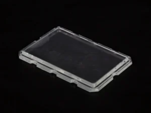 Silicone overmolding onto borosilicate glass for optical and laboratory sealing applications